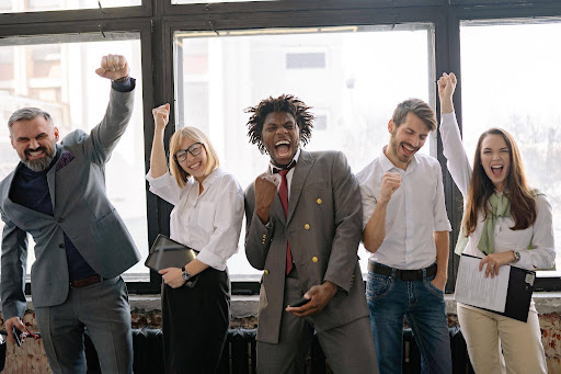 Office-colleagues-celebrating-together.